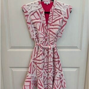 White and Pink short dress with geometric pattern. Belted with ruffle hem.